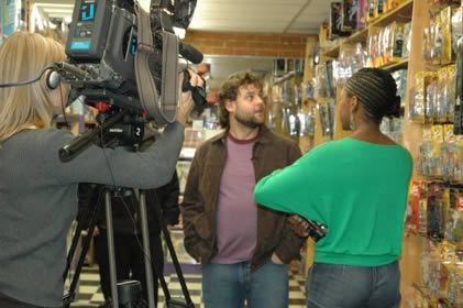 Photo: Chris Turner does an interview at Toronto's 'Silver Snail' comic book store.