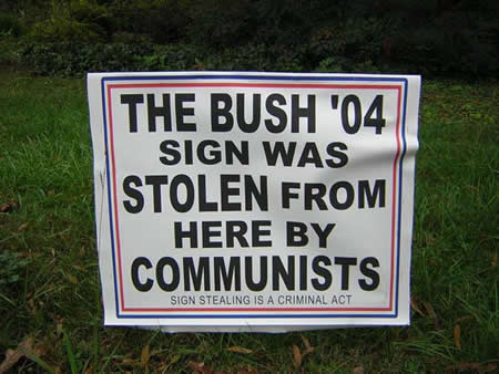 Photo: Lawn sign -- 'The Bush '04 sign was stolen from here by communists'.