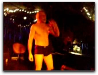 Photo: Still frame from video of Kickass Karaoke at the Bovine Sex Club, November 17, 2004.