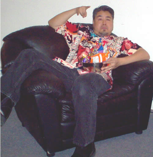 Joey with snacks in a comfy chair in MTV Canada's green room.