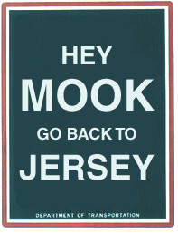 Remixed NYC parking sign that reads: 'Hey MOOK -- go back to JERSEY.'