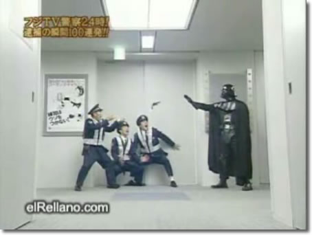 Still from video of Darth Vader facing off against Japanese cops. 