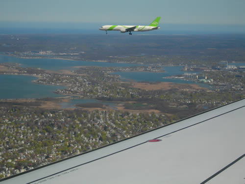 'Song' jet visible off the right wing of my Air canada flight landing at Logan