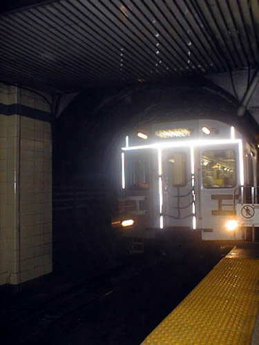 Westbound TTC subway train pulling into Yonge Station, circa 2001.