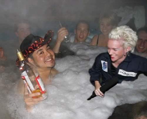The classic 'Accordion Guy Hot Tub Party' photo with Xeni Jardin Photoshopped in.