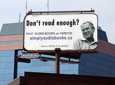 'Don't read enough?' audiobook billboard featuring a photo of George W. Bush.