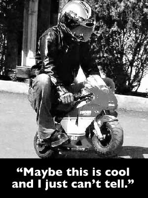Photo of a pocket bike in action with the caption 'Maybe this is cool and I just can't tell.'