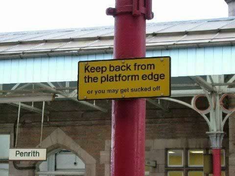 Sign: 'Keep back from the platform edge or you may get sucked off.'
