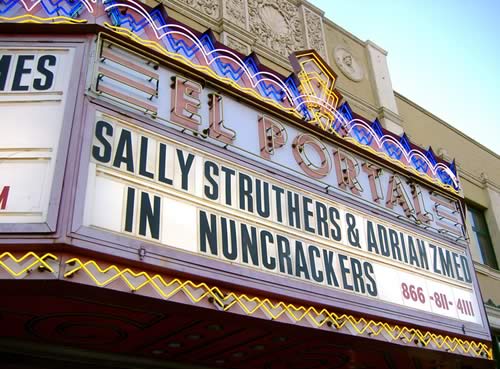 Marquee on El Portal theatre: 'Sally Struthers and Adrian Zmed in NUNCRACKERS'.