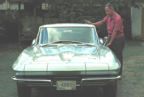 My grandfather and his Corvette, circa 1967.