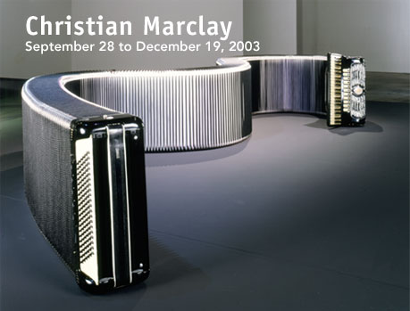 Picture featuring accordion with extra long bellows: 'Christian Marclay: September 28 to December 29, 2003.'