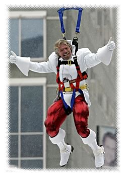 Richard Branson, in a silly outfit, celebrates number portability in Canada.