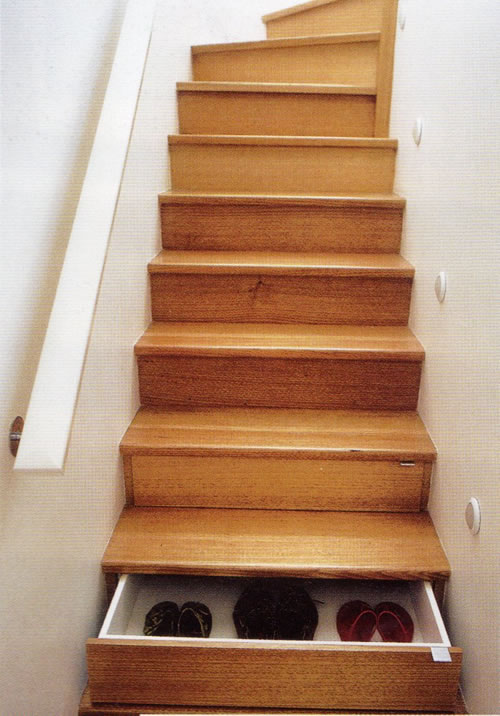 Staircase with drawers embedded in the steps