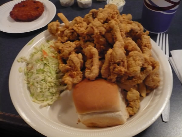 My fried clam dinner with fries, cole slaw and clam cake.