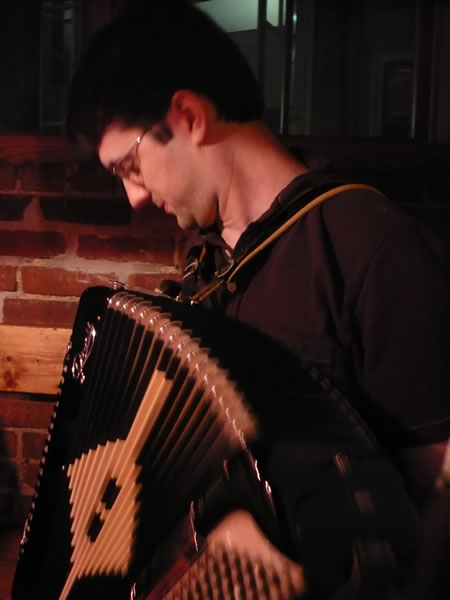 Mike Zole playing accordion at Grendel’s Den, Harvard Square.