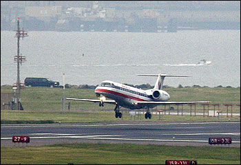American Eagle jet landing at Boston’s Logan Airport.