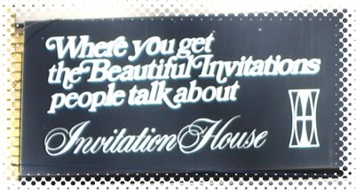 Invitation House’s badly kerned sign