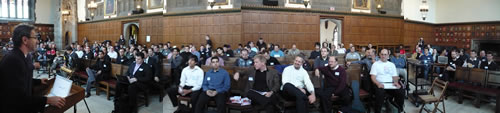 Faux-panoramic shot of the DemoCamp 15 audience in Hart House, University of Toronto