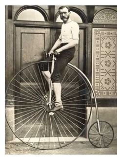 Man on a “Penny-farthing” bicycle