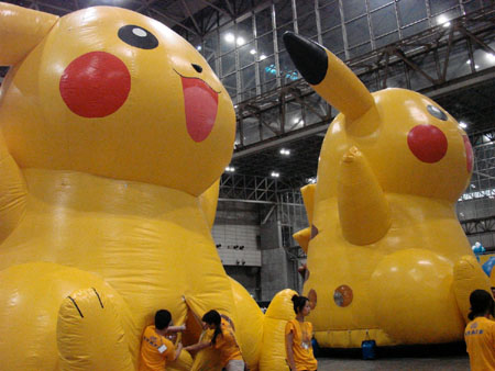 Giant inflatable Pikachu with a doorway in its crotch