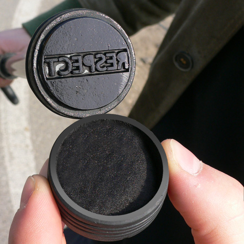 Bottom of 'Respect' cane, revealing its stamp and inkpad
