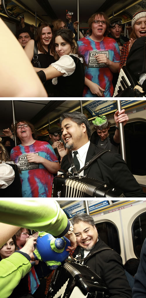 Three shots of me playing accordion at newmindspace’s Hallowe’en subway party