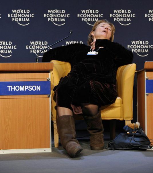 Emma Thompson, slumped and asleep in a chair at the World Economic Forum in Davos.
