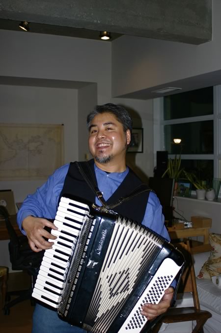 Joey deVilla playing accordion at Tom Purves’ and Michelle Perras’ housewarming