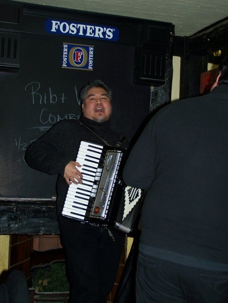 Joey deVilla playing accordion at Hector Catre’s birthday at the Rose and Crown, Yonge and Eglinton, Toronto.