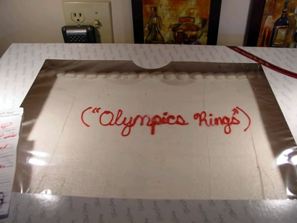 Cake with the text "Olympics Rings"