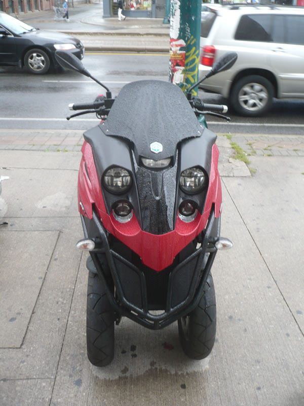 Front view of Jeremy Wright's Piaggio MP3 scooter