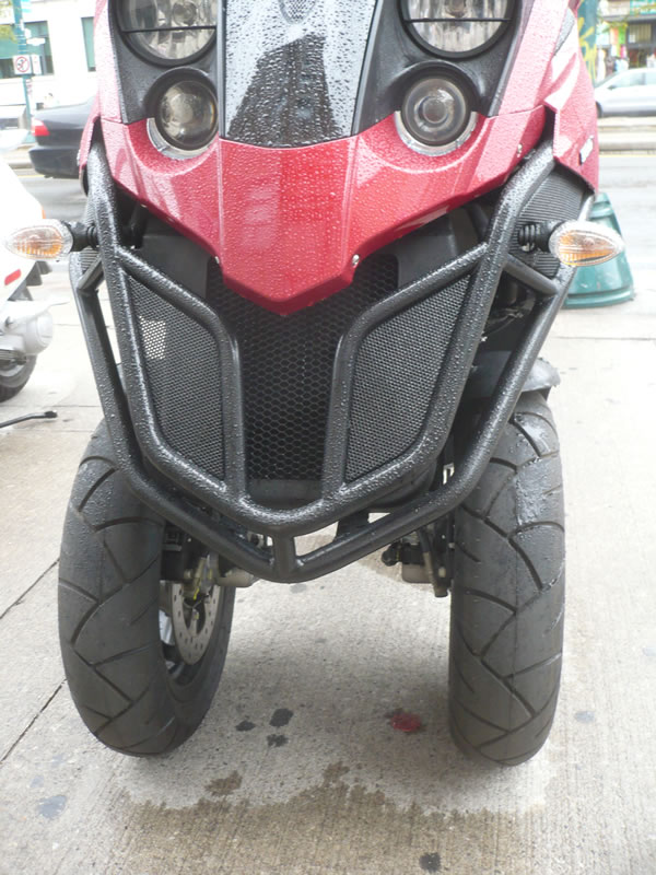 Close-up of front tires on Jeremy's Wright's Piaggio MP3 scooter