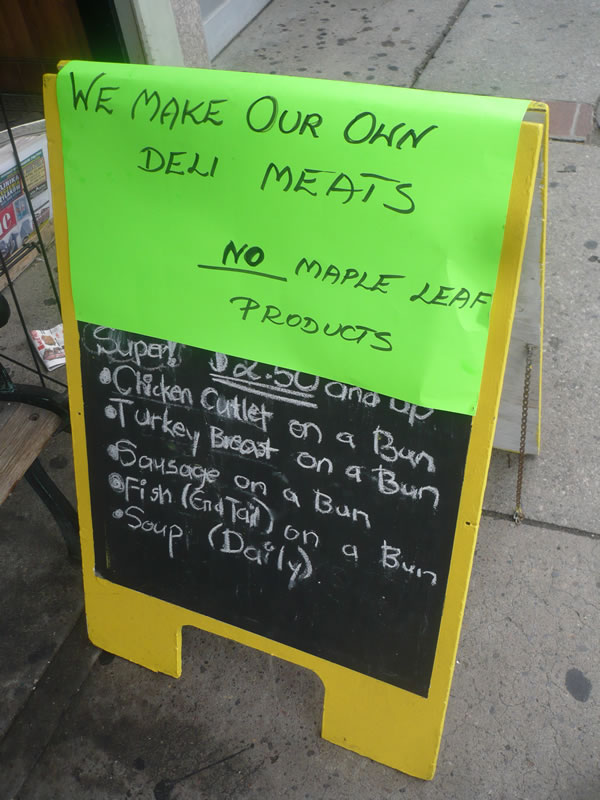 Sign: "We make our own deli meats -- no Maple Leaf products"