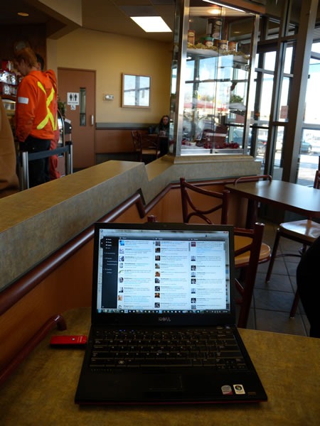 My laptop on a table at Tim Hortons