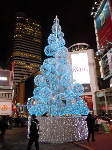 A Christmas tree made of lights at Dundas Square