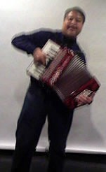 Joey deVilla playing accordion