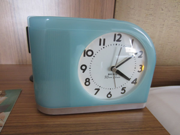 Closeup of 1950s-style alarm clock