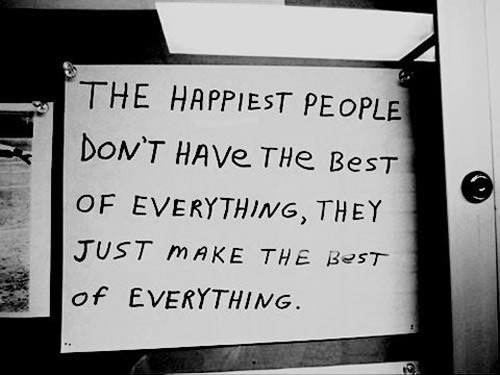 Handwritten poster: "The happiest people don't have the best of everything, they just make the best of everything."