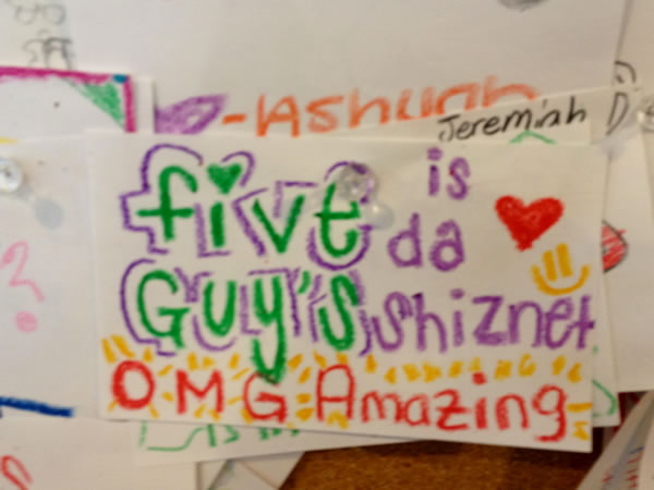 Card on the Five Guys 'compliments' board that reads 'Five Guys is da shiznet'.