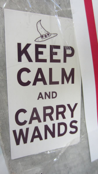 Poster: "Keep calm and carry wands."