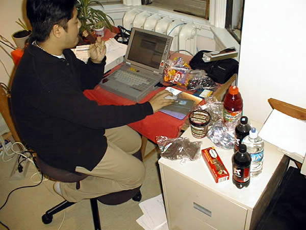 Joey deVilla (circa 1998) working away on his laptop