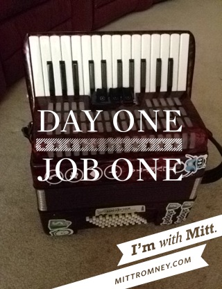 Joey's accordion overlaid with "Day one, job one" from the "With Mitt" app