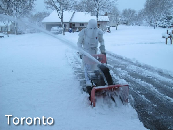 Toronto: Star Wars snowtrooper snowblowing a driveway