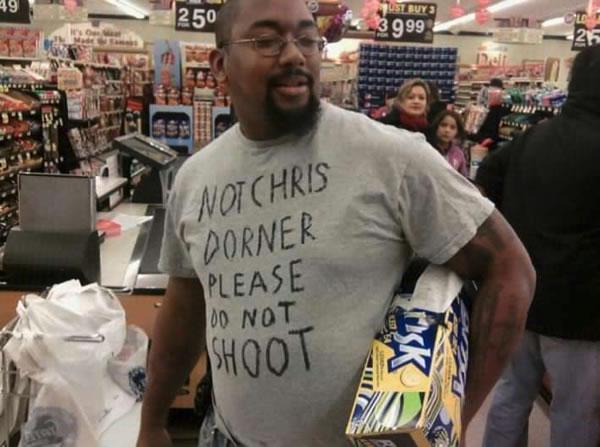 Guy in T-shirt with "Not Chris Dorner - please do not shoot" written on it in magic marker