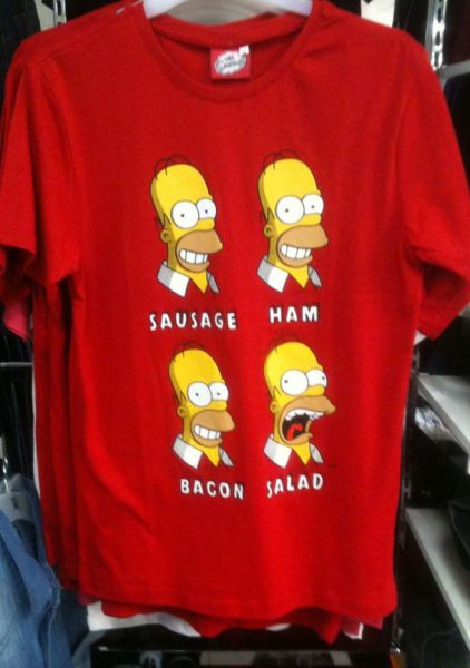 Red T-shirt featuring 4 faces of Homer Simpson, each with the name of a food under it: Sausage (Homer smiling), Ham (Homer smiling), Bacon (Homer smiling), Salad (Homer screaming).