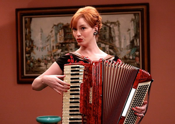 Joan (Christina Hendricks) from 'Mad Men' playing the accordion.
