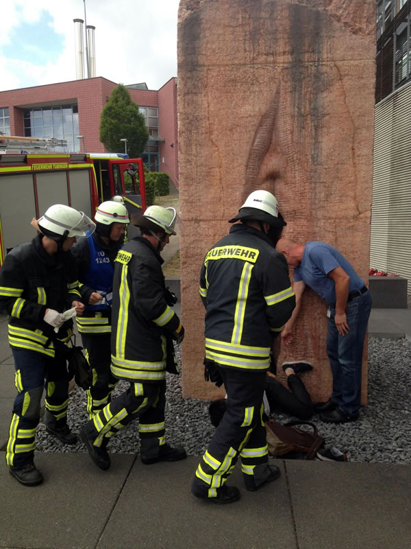 firefighters rescue guy trapped in giant vagina statue
