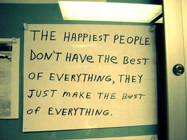 Photo: Handwritten sign with the text 'The happiest people don't have the best of everything, they just make the best of everything.'