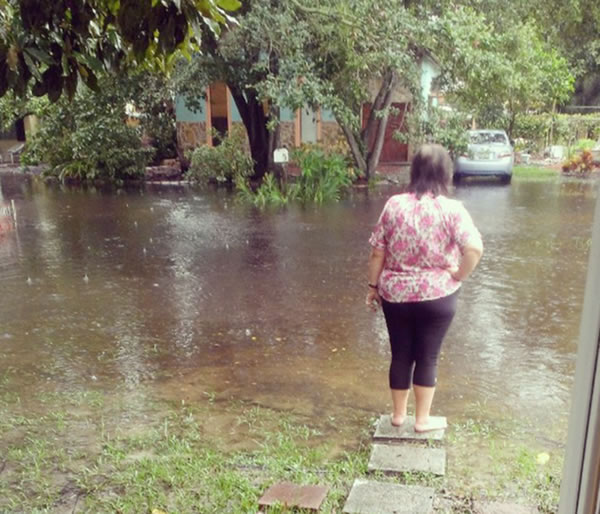 woman looking at flood
