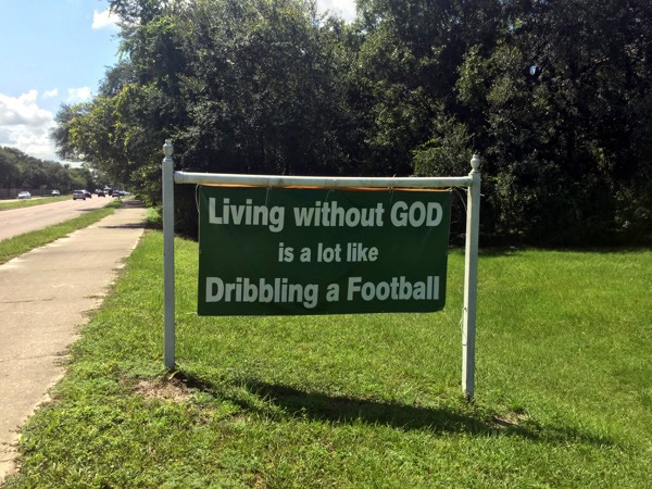 living without god is a lot like dribbling a football